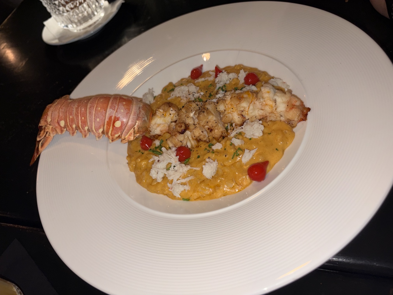 Creamy risotto topped with Caribbean lobster meat