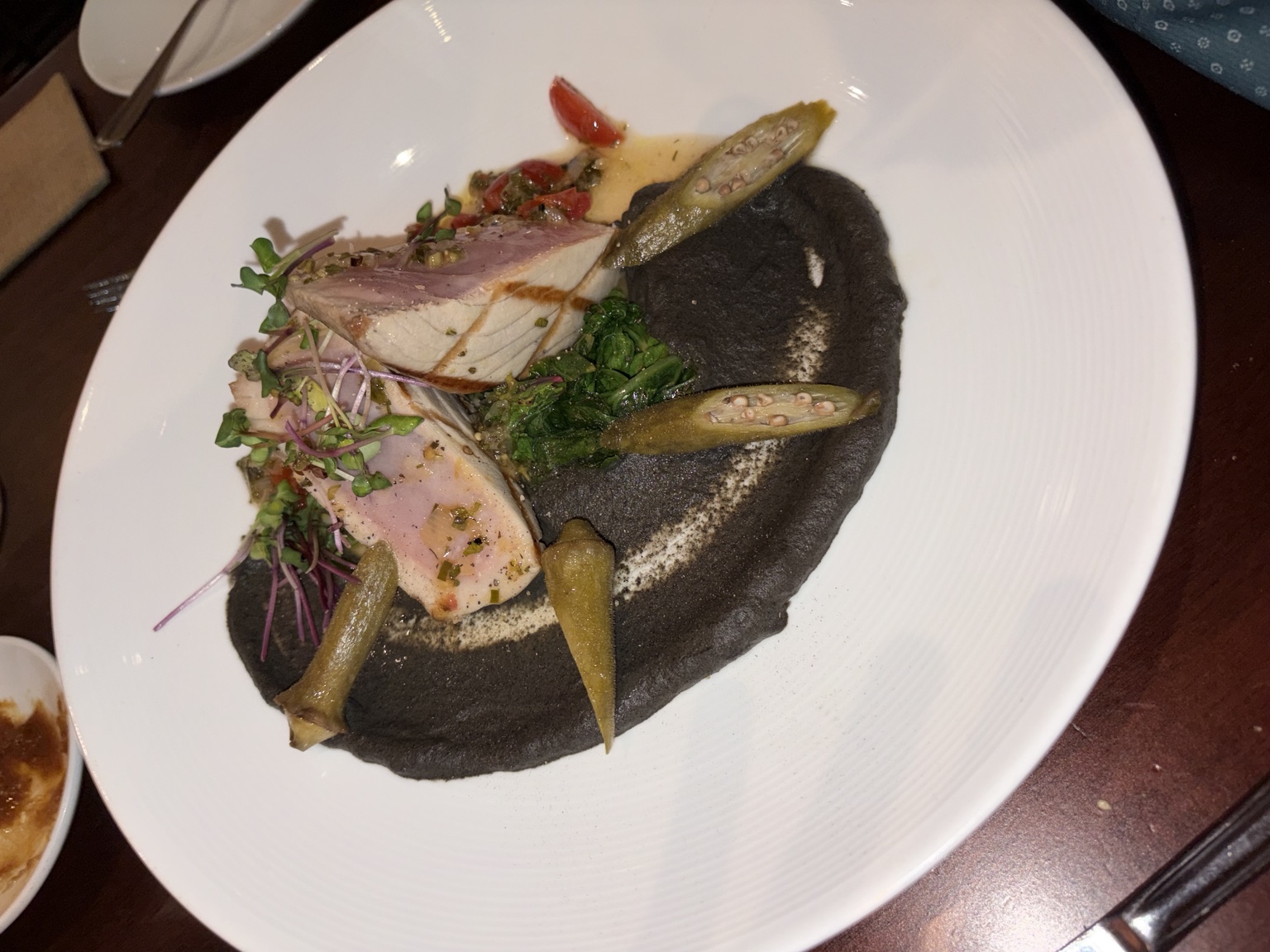 Seared tuna with greens, okra and dark puree