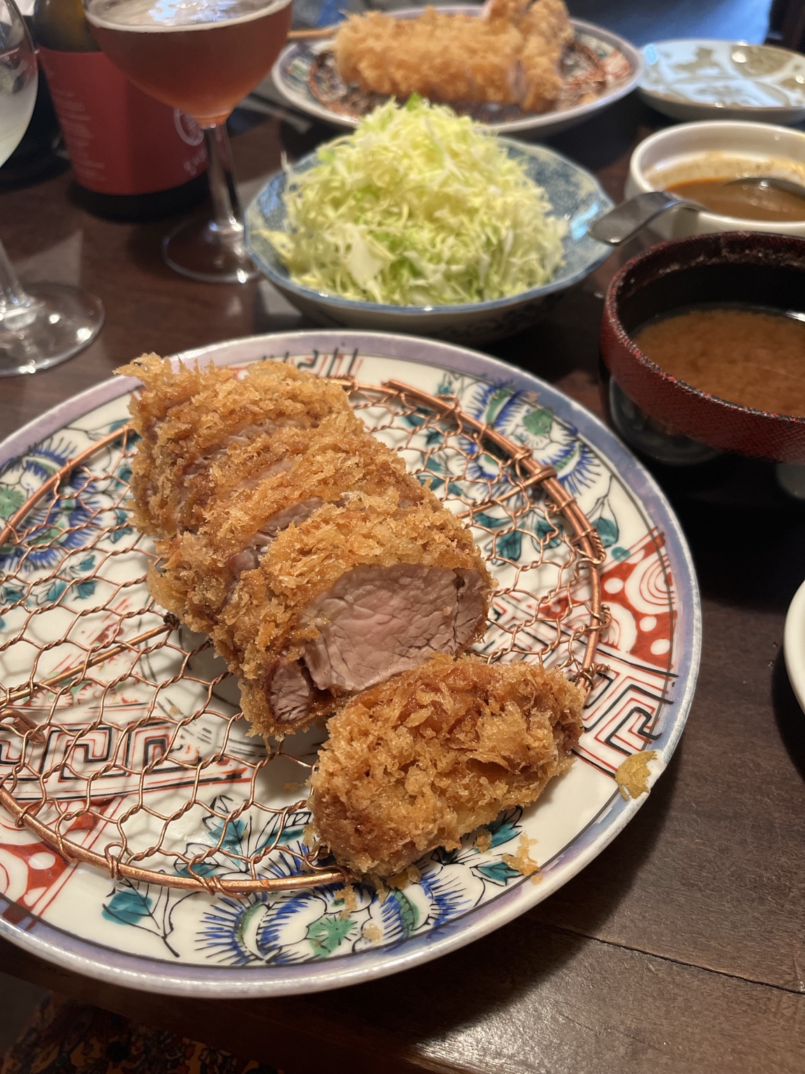 Sliced breaded cutlet with shredded cabbage, sauce and soup