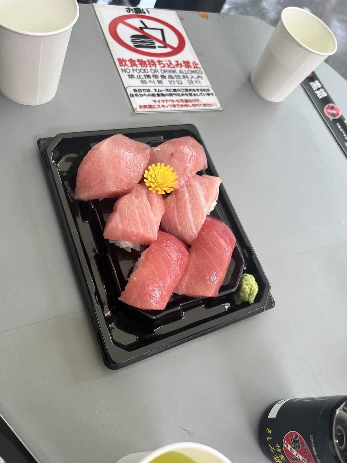 Tray of tuna nigiri featuring lean and marbled cuts