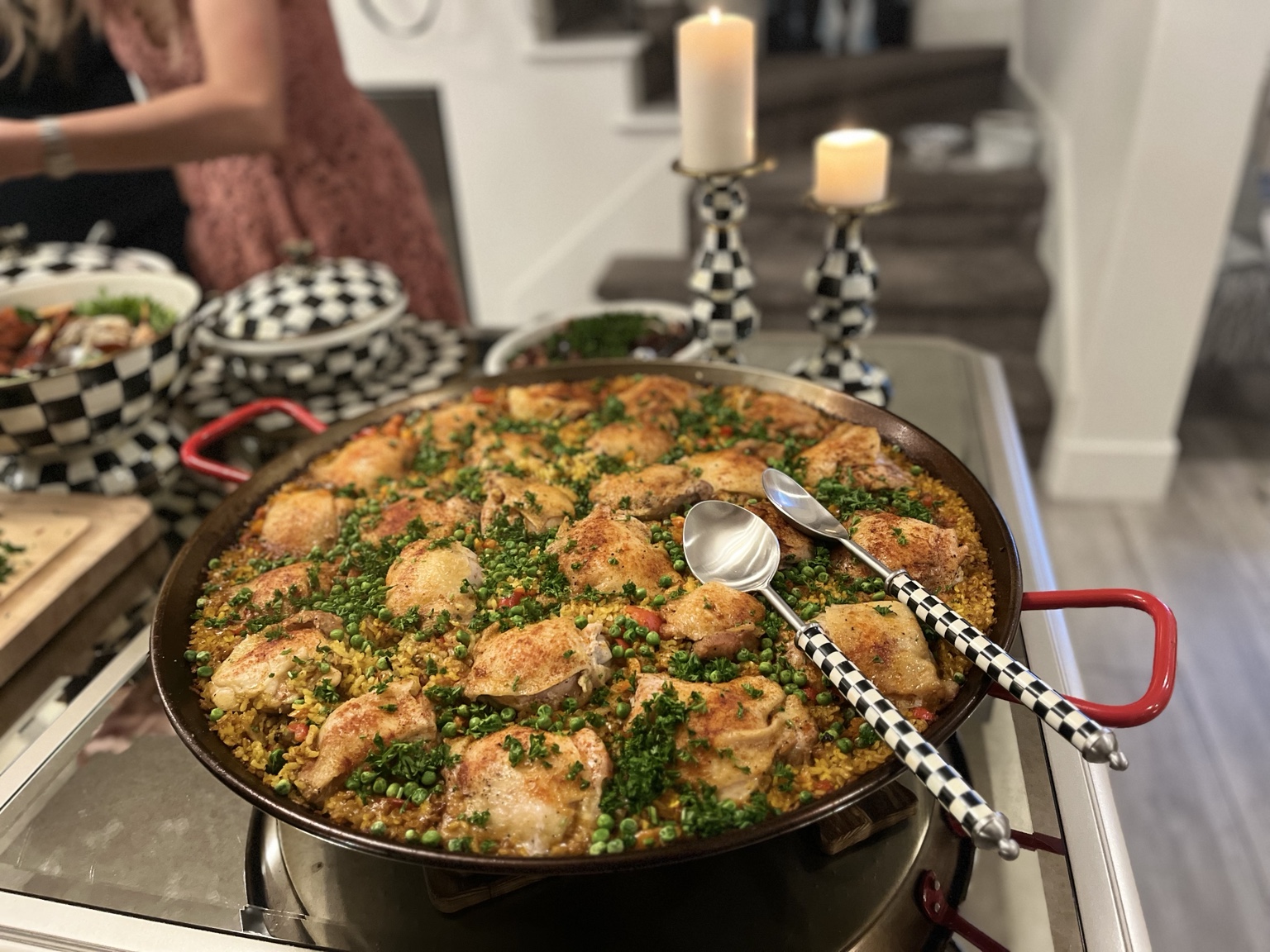 Large pan of golden rice with chicken, peas, peppers and herbs