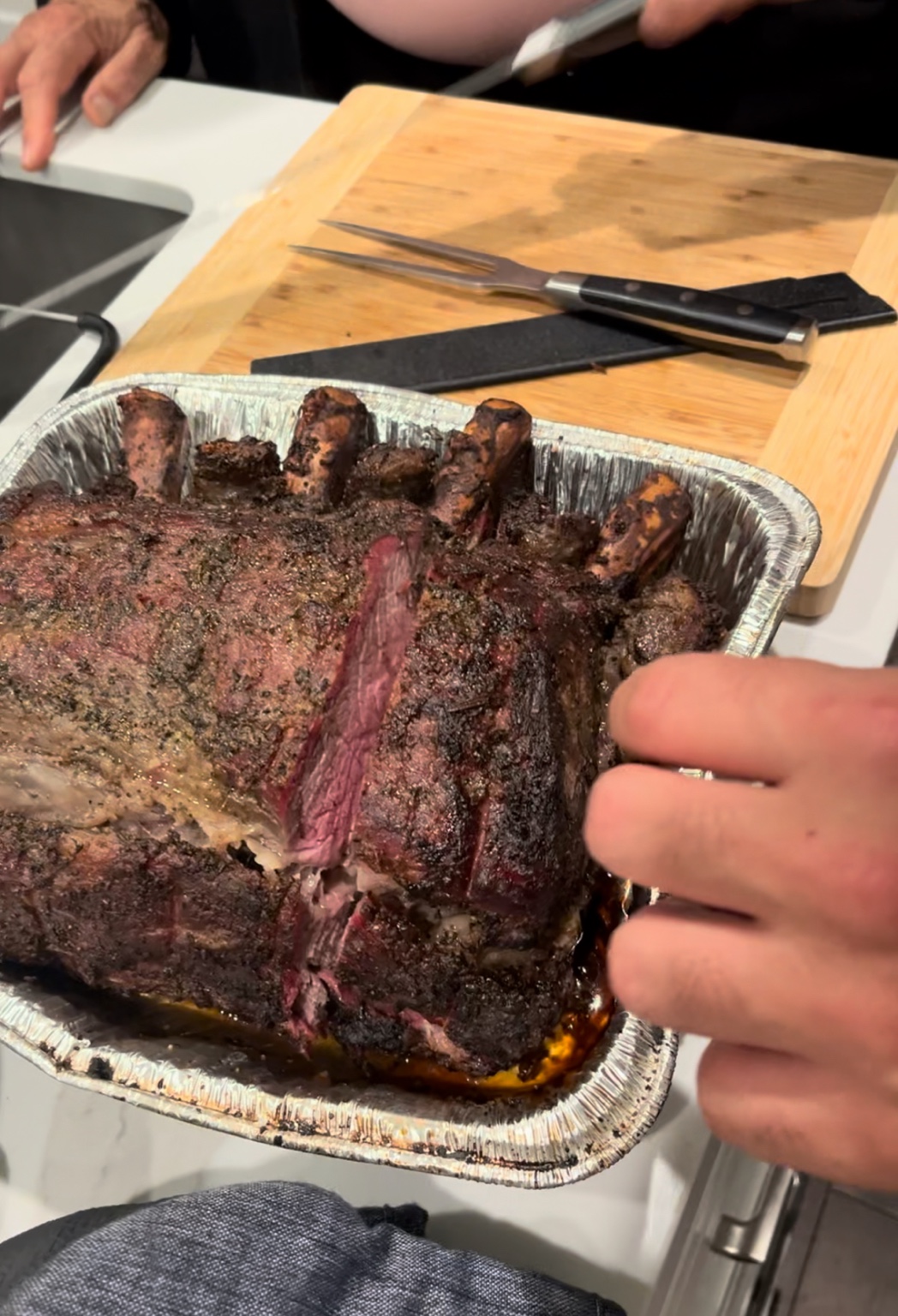 Bone-in standing rib roast with a dark crust and rosy center